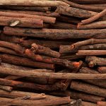 Macro closeup background texture of Organic Manjistha or Indian madder (Rubia cordifolia).